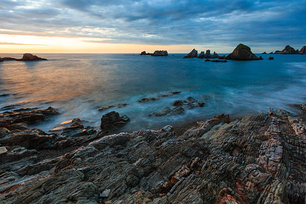 istock Gueirua beach at evening. Asturias, Spain. 610673818