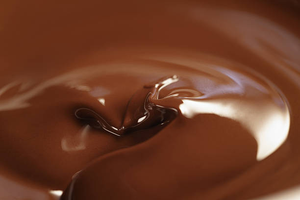 istock melted dark chocolate closeup photo 610675954