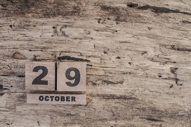 istock cube calendar for october on wooden background 610677136