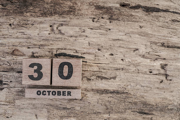 istock cube calendar for october on wooden background 610677302
