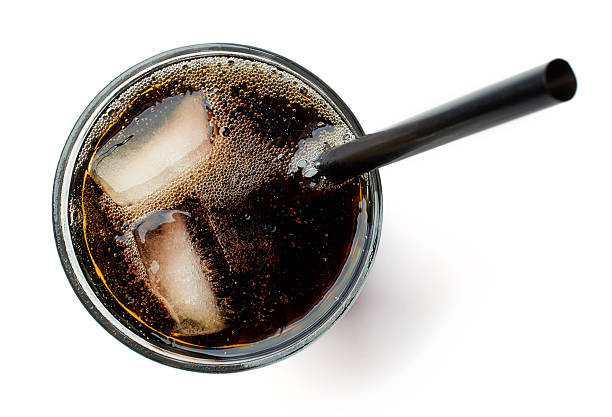 istock Glass of cola isolated on white, from above 610680072