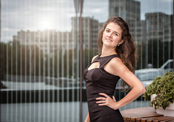 istock Beautiful young lady wearing classic clothes 610680394