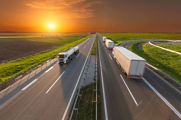 istock Truck in motion blur on the freeway at sunset 610681920