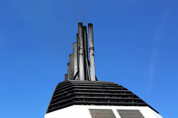 istock Chimneys Ferry Against A Blue Sky 610682124