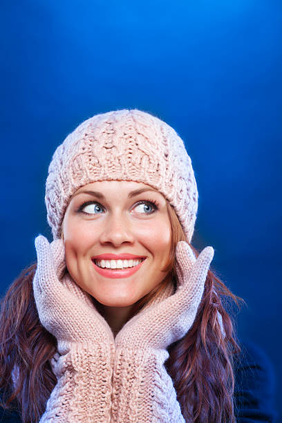 Close-up of beautiful woman face with red curly hair