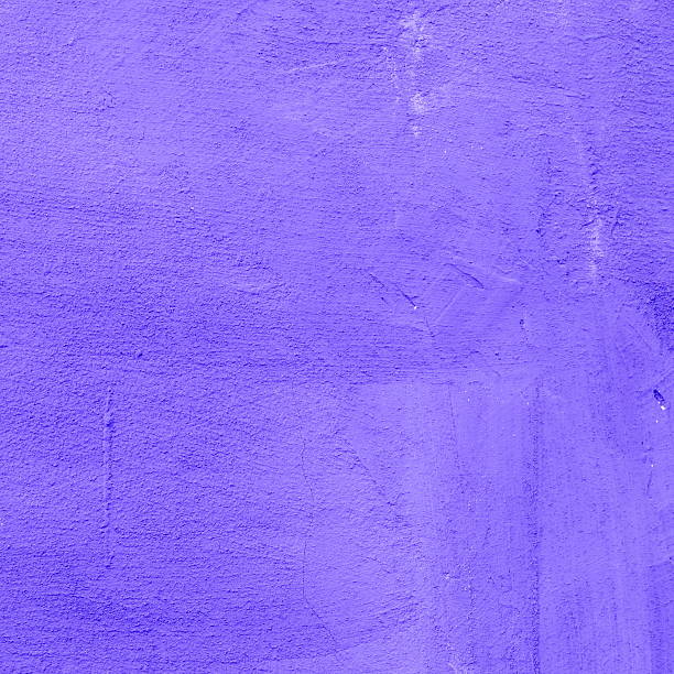 istock Background of a deep purple stucco coated and painted exterior 610685984