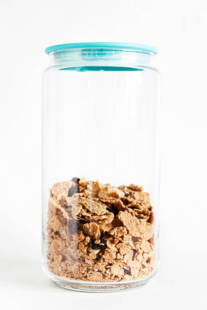istock Organic cornflakes in glass bottle storage 610687942