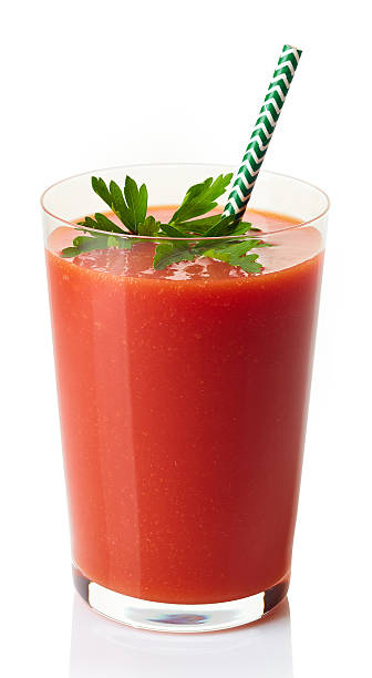 istock Glass of fresh tomato juice 610689954