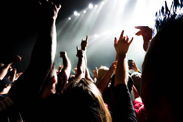 istock silhouette people rock show 610690328