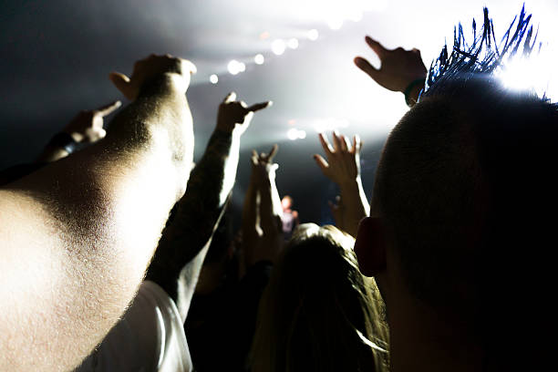 istock silhouette people rock show 610690396