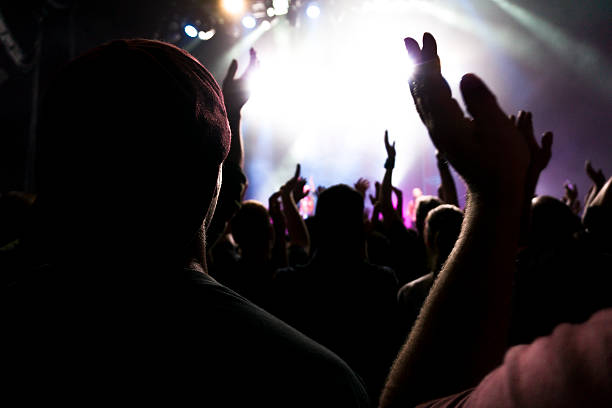 istock silhouette people rock show 610690512