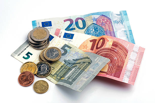 European banknotes and coins European banknotes and coins on white background. five euro banknote photos stock pictures, royalty-free photos & images
