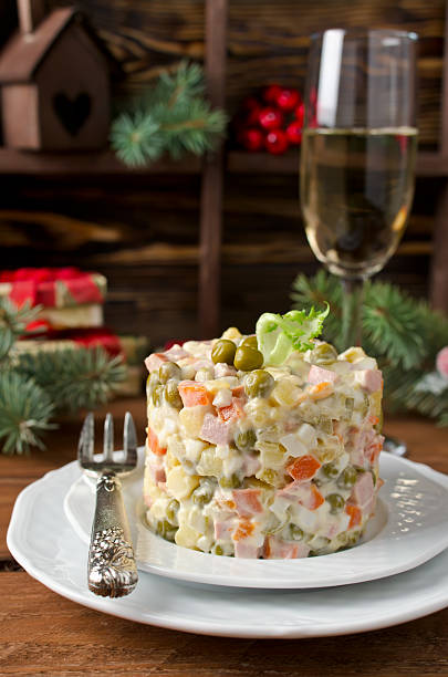 istock Russian traditional salad Olivier with vegetables and meat 610690888