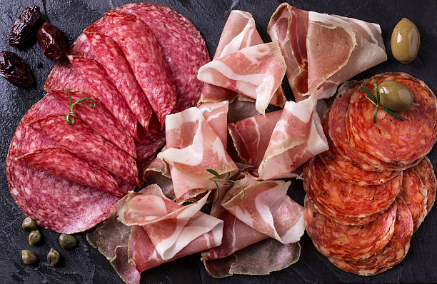 Traditional spanish tapas or italian antipasti Traditional spanish tapas or italian antipasti salami stock pictures, royalty-free photos & images
