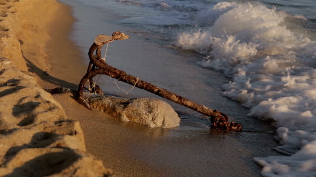 Anchor on a deserted beach