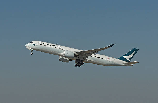 Airbus A350-941 of Cathay Pacific while take-off stock photo