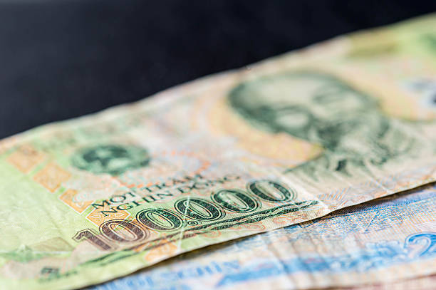 istock Vietnamese banknote of 100,000 VND closeup 610744676
