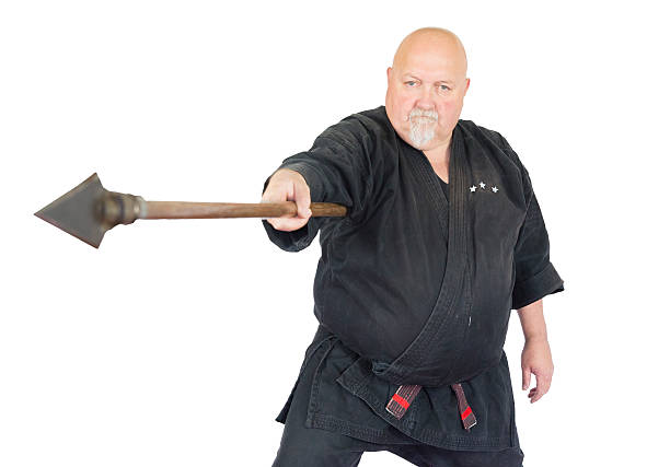 Black belt ninju warrior with spear Yari at the ready