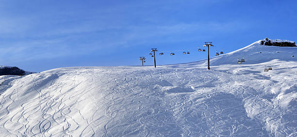 istock Panoramic view on sunlight off-piste slope at morning 610745778