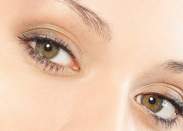 istock beautiful woman green eyes and make up 610748448