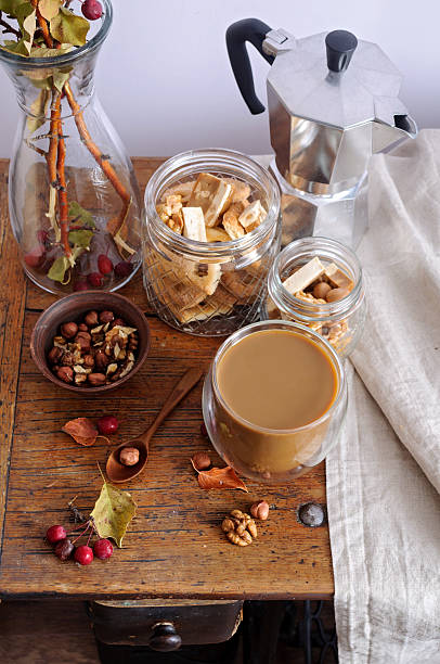 istock Still life with coffee, nuts and small apples 610750410