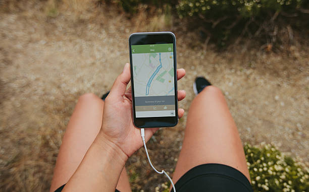 istock Sportswoman checking smartphone after jogging 610750618