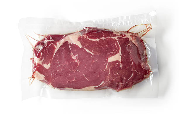 istock Fresh beef steak for sous vide cooking, isolated on white 610750756