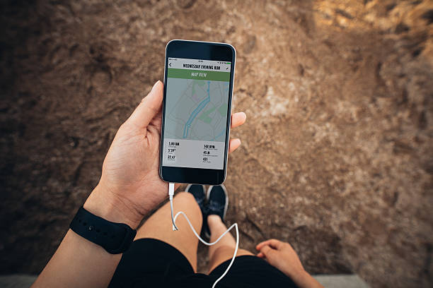 istock Sportswoman checking smartphone after jogging 610750836