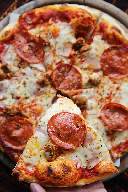 istock pepperoni pizza on wooden 610754086