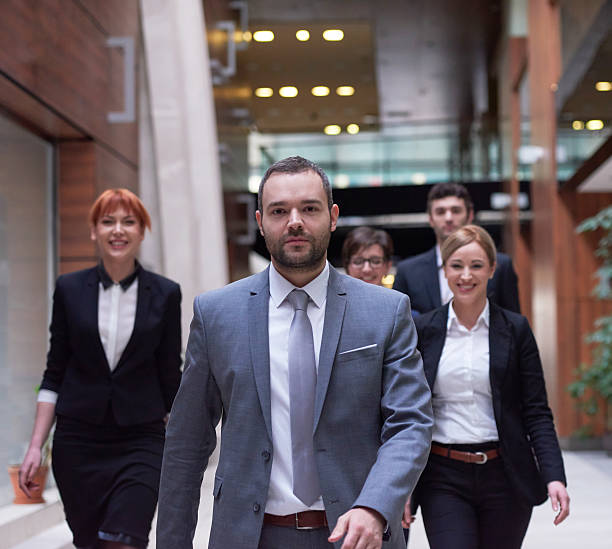 istock business people team walking 610754180