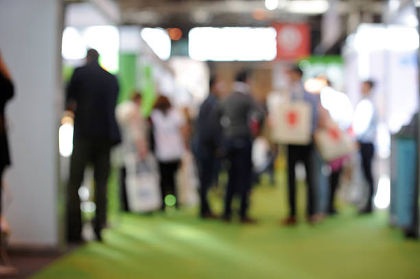 istock People at a Tradeshow - Stock Photo 610756474