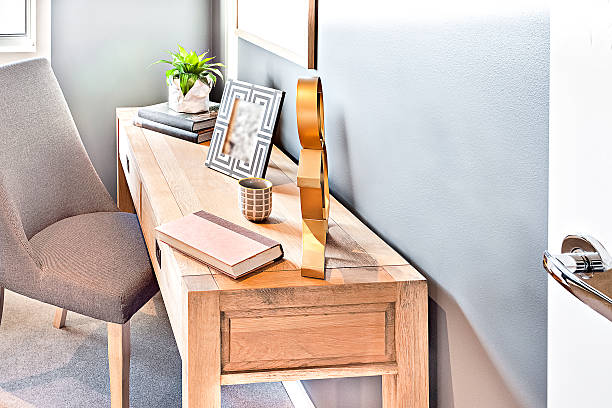 istock Workplace with a cushion chair and wooden table 610757204