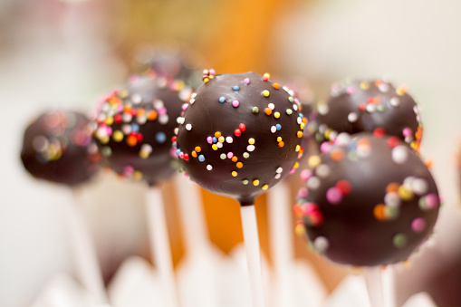 Delicious chocolate cake pops with sprinkles - sweet food