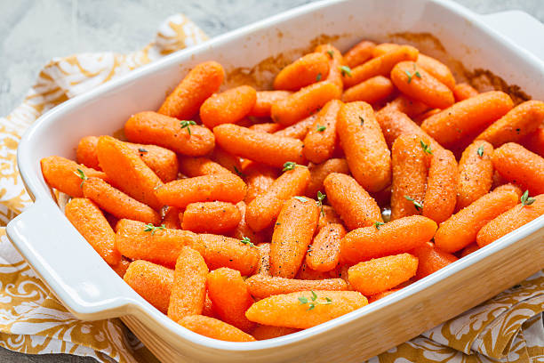 istock Honey Glazed Baby Carrots With Thyme 610757568