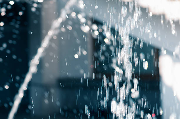 istock he gush of water a fountain. Splash, abstract image. 610757714