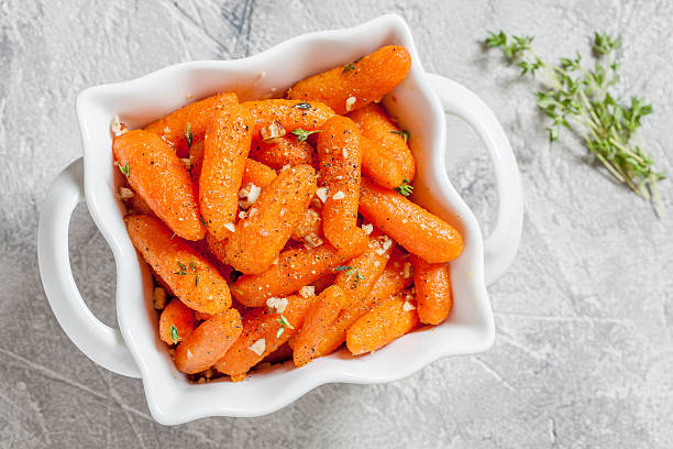 istock Honey Glazed Baby Carrots With Thyme 610758088
