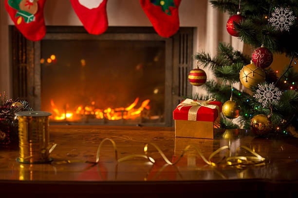 istock Christmas background with burning fireplace and Christmas tree 610759486
