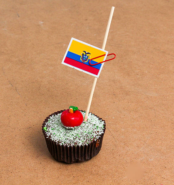 istock Ecuador flag. Apple Cupcake with red apple shape bonbon 610761630