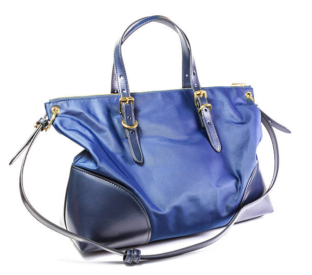 istock Female handbag isolated on white background 610763106