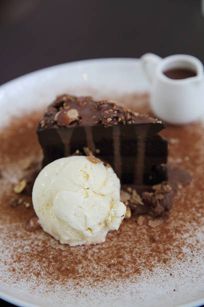istock Dark chocolate cake with vanilla ice cream 610765840