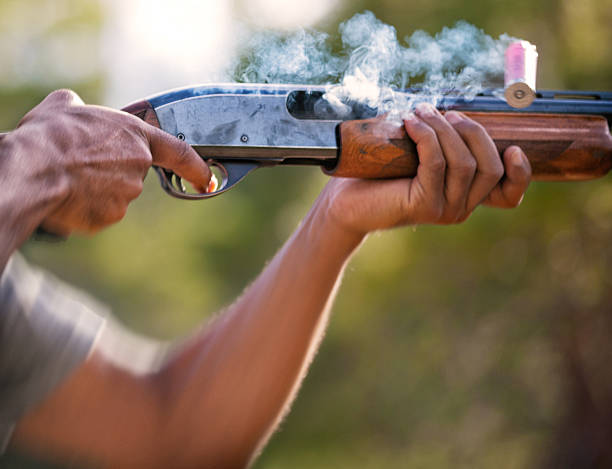 Shotgun fired and shell expelled stock photo