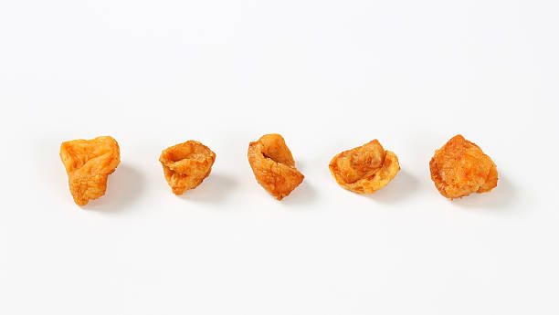 istock Fried pieces of pork rind and fat 610767588