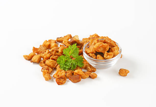 istock Fried pieces of pork rind and fat 610768058