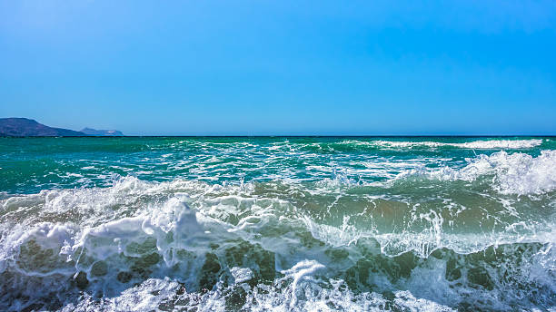 istock High sea wave with foam and spray 610768298
