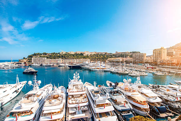 Monte Carlo in Monaco Landscape view on the bay with luxury yachts on the french riviera in Monte Carlo in Monaco monaco stock pictures, royalty-free photos & images