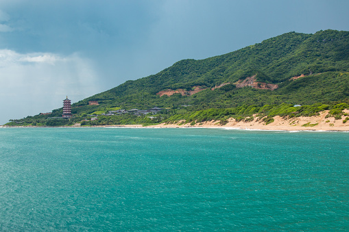 Building in asia style on beautiful beach in China