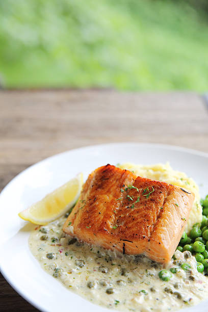 istock Grilled baked Salmon with potato and beans 610769410