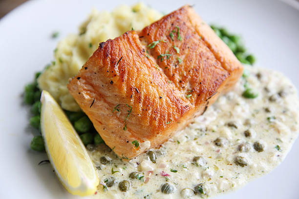 istock Grilled baked Salmon with potato and beans 610769870