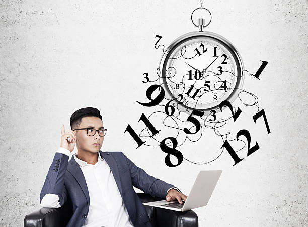 istock Asian businessman and stopwatch 610769940