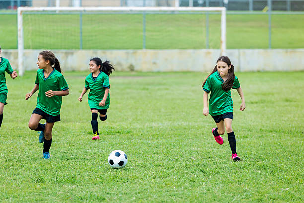 istock Young female athletes during soccer game 610771242